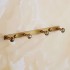 Antique 4 Hook - +1,40 €